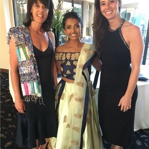 Off the shoulder mint and navy lehenga choli.